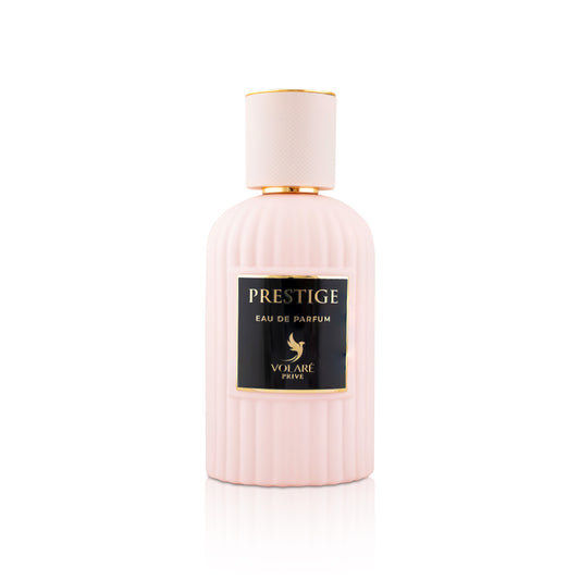 Pink perfume bottle with black label on a white background