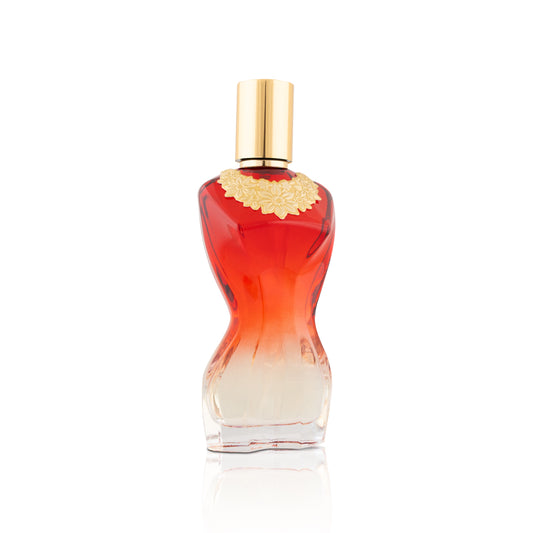 Red and gold perfume bottle on a white background