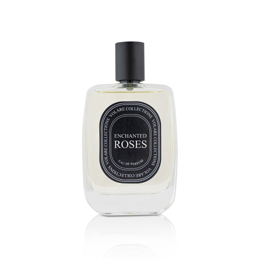 Perfume bottle labeled 'Enchanted Roses' on a white background