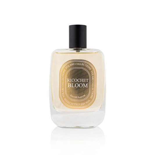 Perfume bottle labeled 'Ricochet Bloom' on a white background